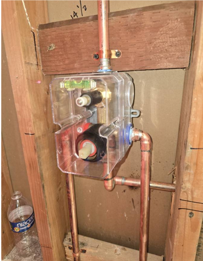 Shower valve rough-in installed with copper supply lines